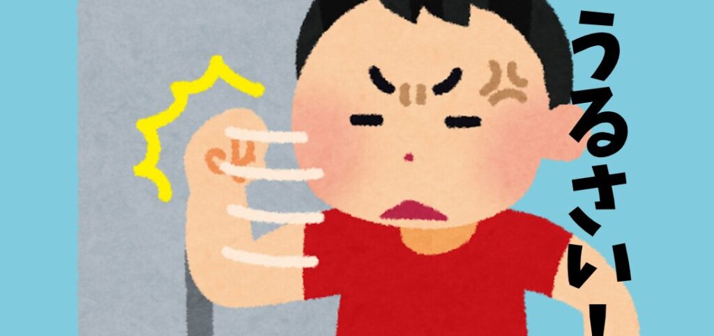 隣の騒音に困って、相手の部屋に向けて壁を叩いている画像